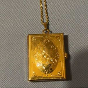Avon Book Gold Tone Locket